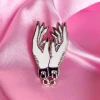 BOBBY PINS CO. TIED HANDS ENAMEL PIN Back In Stock