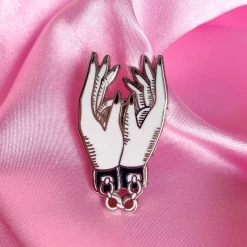 BOBBY PINS CO. TIED HANDS ENAMEL PIN Back In Stock